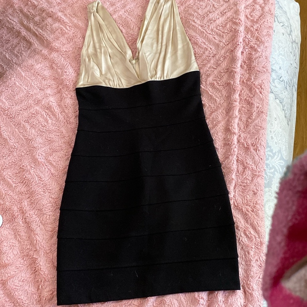 WYL size small black stretchy fitted dress. Very sexy and classy.